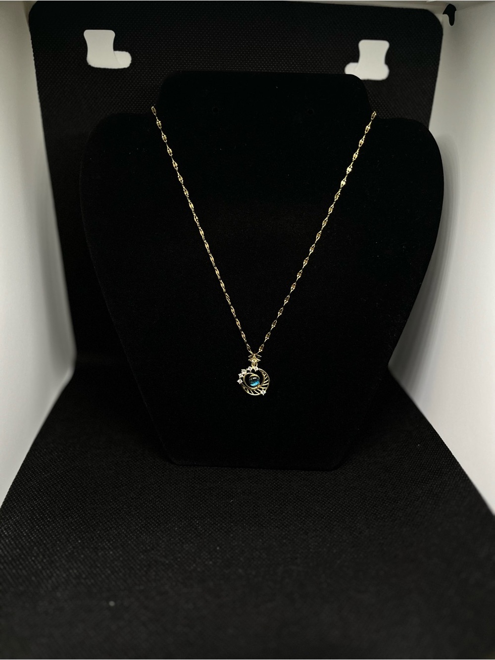 Gold-tone Pendant Necklace with Blue Gem
